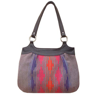 Illustration for article titled Kim White Creates Handbags From Vintage Automotive Interior Fabric